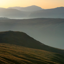 Sunset view from Raise in February across Watendleth Fell and the Borrowdale Fells to Pillar mountain